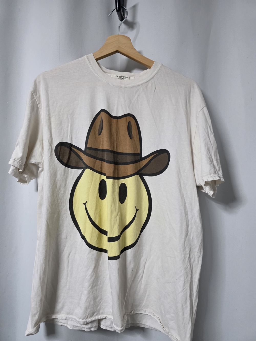Project Social T Cream Tee with Yellow Smiley and Brown Cowboy Hat